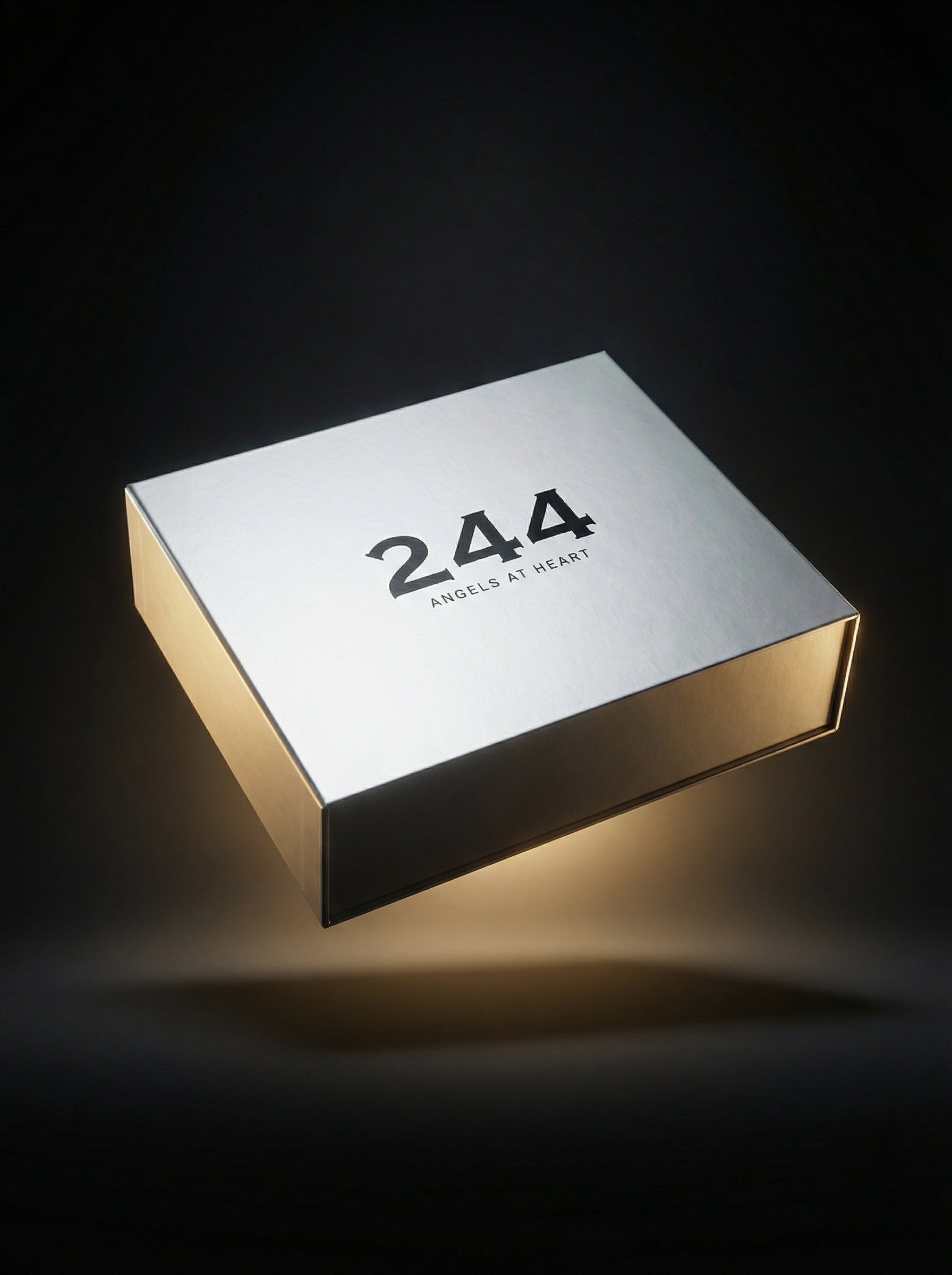 244 angels at heart magnetic box with platifnum finish floating on a black studio