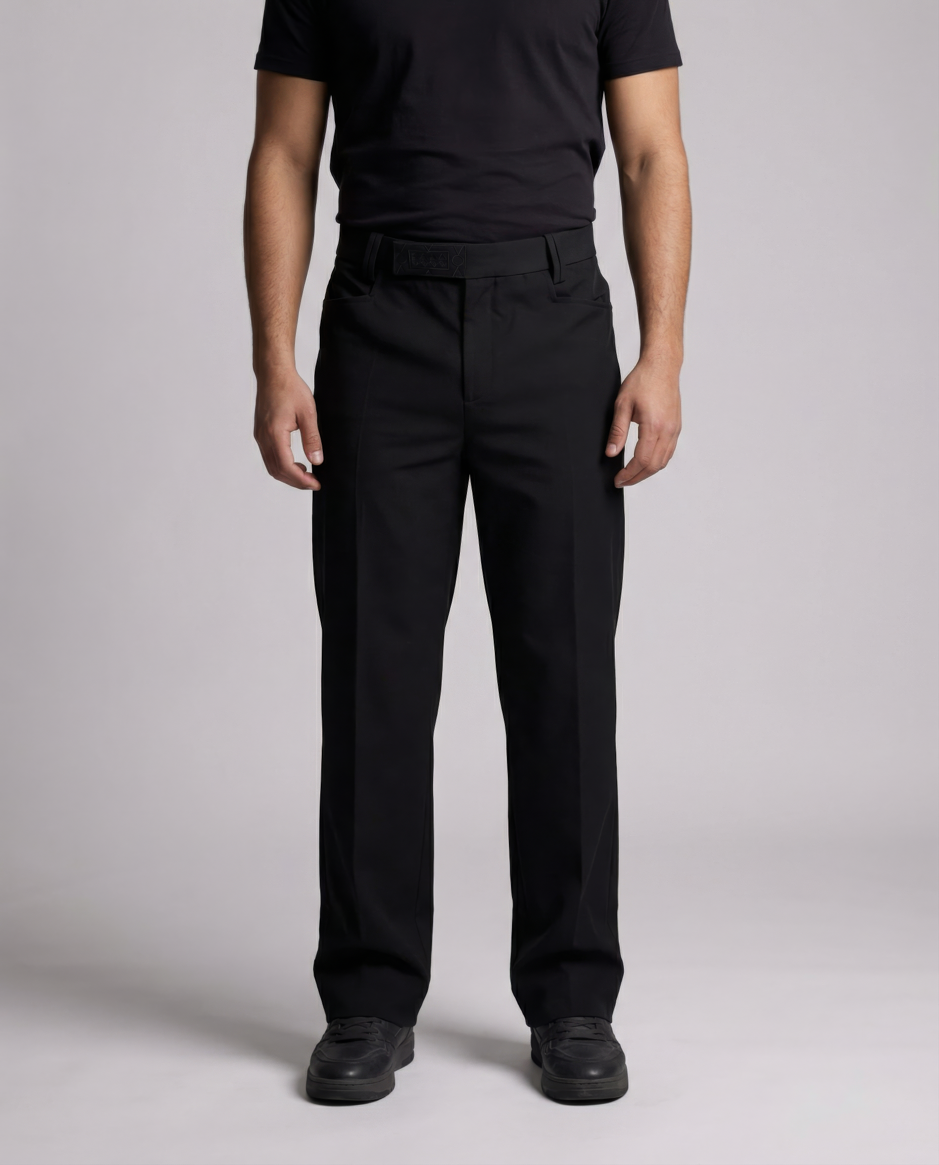 Person wearing Sentinela Straight-leg black pants and a black shirt on a plain background. Front view